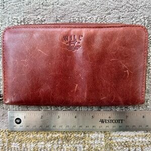 Will leather goods zip around leather clutch wallet